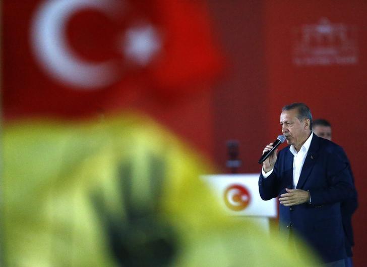 Turkish President Tayyip Erdogan speaks during Democracy and Martyrs Rally, organized by him and supported by ruling AK Party (AKP), oppositions Republican People's Party (CHP) and Nationalist Movement Party (MHP), to protest against last month's failed military coup attempt, in Istanbul, Turkey, August 7, 2016.  REUTERS/Osman Orsal/Files