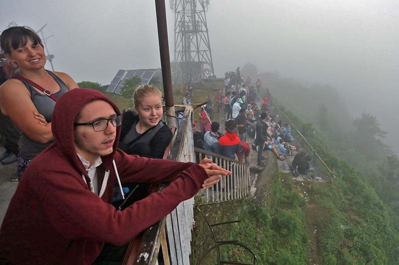 Local and foreign tourists wait for the sunrise at Sarangkot of Pokhara in Kaski district on Saturday, October 15, 2016. Photo: RSS