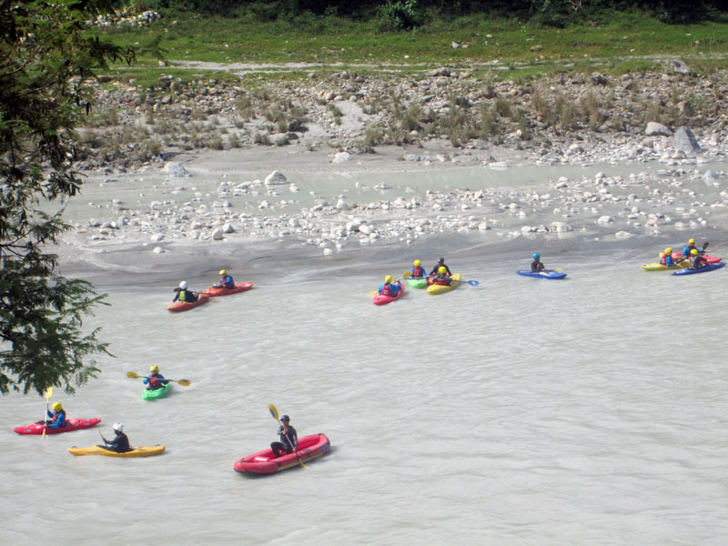 Tourists are seen kayaking in Madi river at Byas Municipality of Tanahun district on Saturday, October 15, 2016. Photo: Madan Wagle/THT