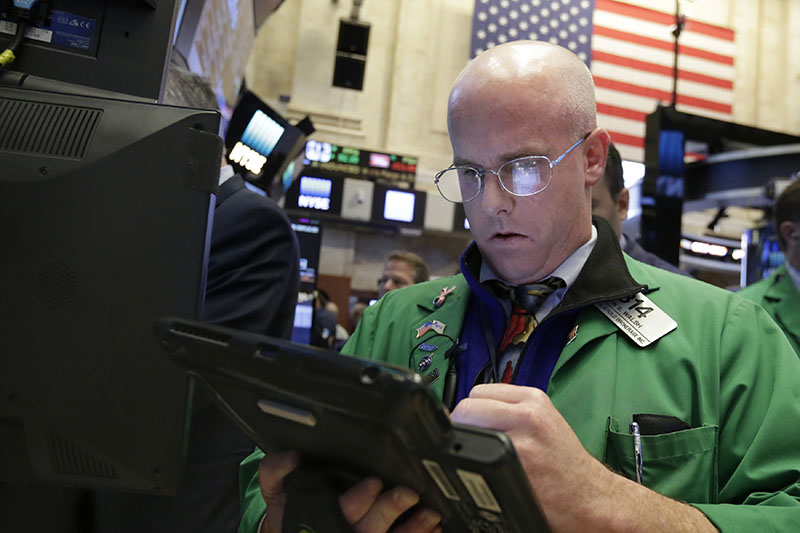 Trader Kevin Walsh works on the floor of the New York Stock Exchange, on Monday, October 24, 2016. Photo: AP