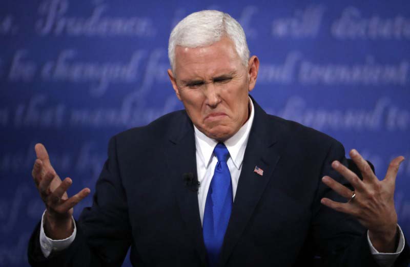 Republican vice presidential nominee Mike Pence grimaces as he discusses an issue during his vice presidential debate with Democratic vice presidential nominee Senator Kaine at Longwood University in Farmville, on Tuesday, October 4, 2016. Photo: Reuters