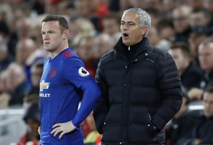 Britain Football Soccer - Liverpool v Manchester United - Premier League - Anfield - 17/10/16nManchester United's Wayne Rooney prepares to comes on as Jose Mourinho looks onnAction Images via Reuters / Carl Recine/ Livepic