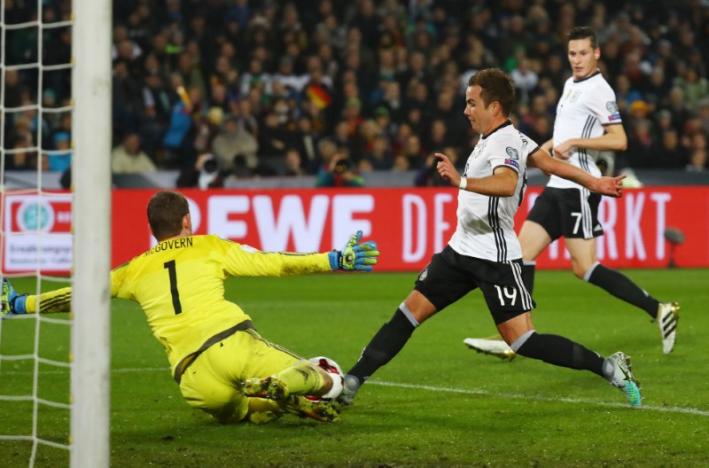 Football Soccer - Germany v Northern Ireland - 2018 World Cup Qualifying European Zone - Group C - HDI Arena, Hannover, Germany - 11/10/16nNorthern Ireland's Michael McGovern saves from Germany's Mario Gotze nReuters / Kai PfaffenbachnLivepic