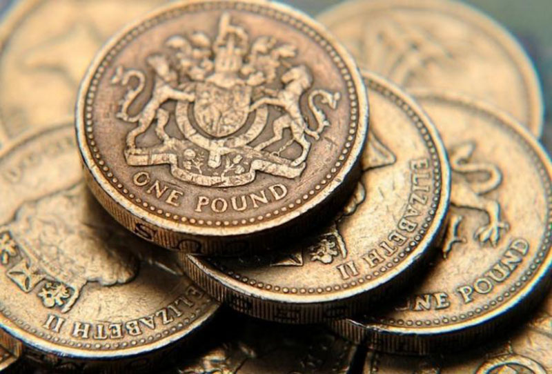A pile of one pound coins is seen in a photo illustration shot, on June 17, 2008. Photo: Reuters