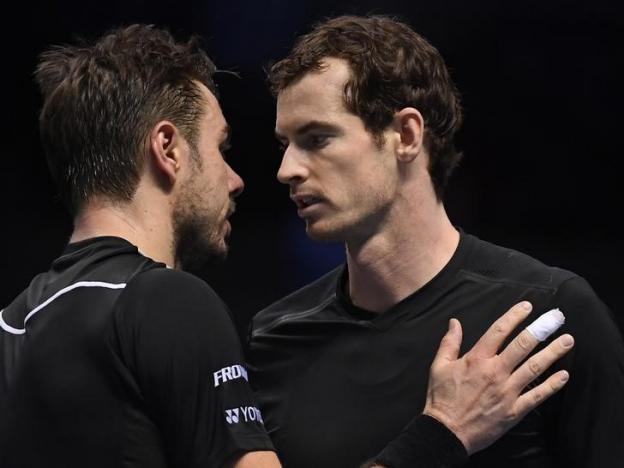 Britain Tennis - Barclays ATP World Tour Finals - O2 Arena, London - 18/11/16 Great Britain's Andy Murray and Switzerland's Stanislas Wawrinka after their round robin match  Reuters / Toby Melville Livepic