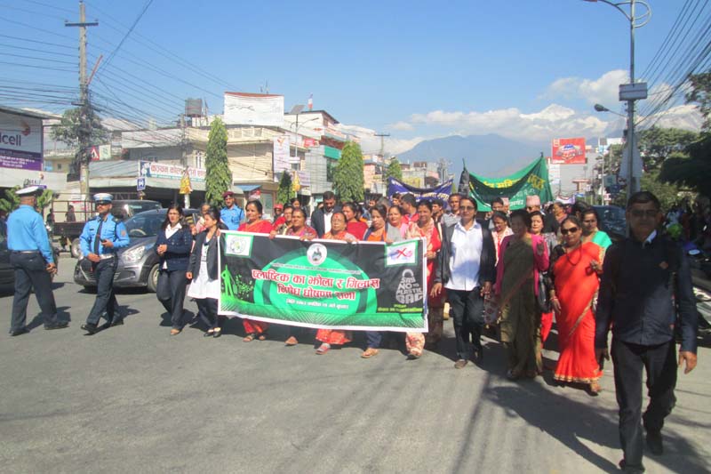 Locals of Pokhara hold a rally to raise public awareness against the use of plastic bags in Kaski district on Wednesday, November 9, 2016. Photo: Rishi Ram Baral