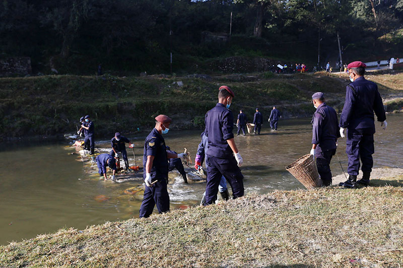 Bagmati clean-up campaign proceeds with cleaning the river on its 183rd week, near Guhyeshwari Bridge in Pashupati Area, Kathmandu, on Saturday, November 12, 2016. 