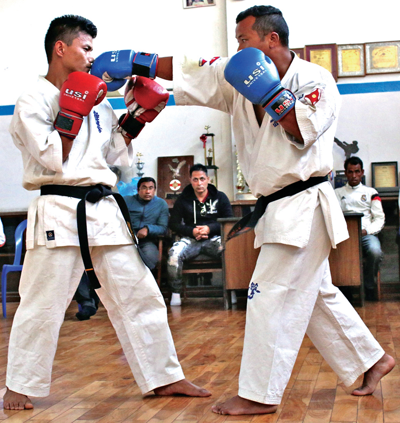 Karate players demonstrate newly-formed professional martial art Bajra at the Dasharath Stadium in Kathmandu on Wednesday, November 9, 2016. Photo: THT