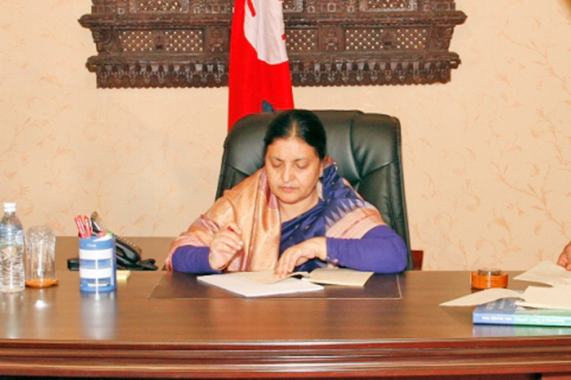 President Bidya Devi Bhandari certifies six bills endorsed by the Legislature-Parliament, in Kathmandu, on Monday, November 14, 2016. Photo: President's Office