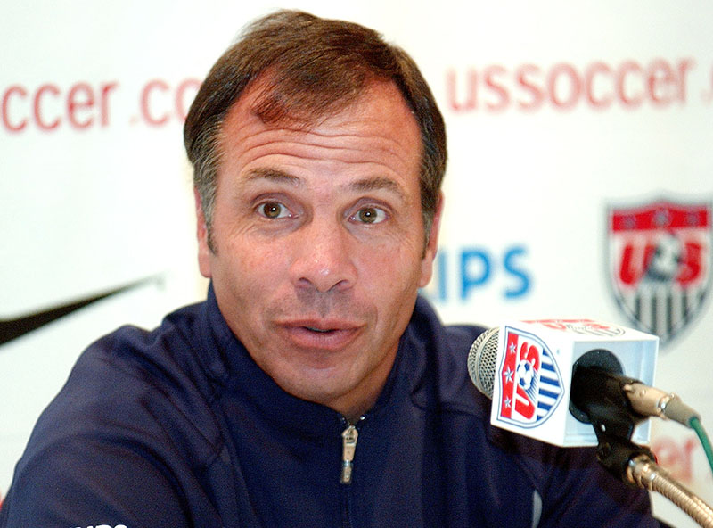 FILE - Bruce Arena, head coach of the US soccer team, addresses a questions during a news conference at the team's hotel in Seoul, South Korea, in advance of a World Cup match against Poland, on June 12, 2002. Arena is returning to coach the U.S. national team, a decade after he was fired. The winningest coach in American national team history, Arena took over Tuesday, Nov. 22, 2016, one day after Jurgen Klinsmann was fired. Photo: AP