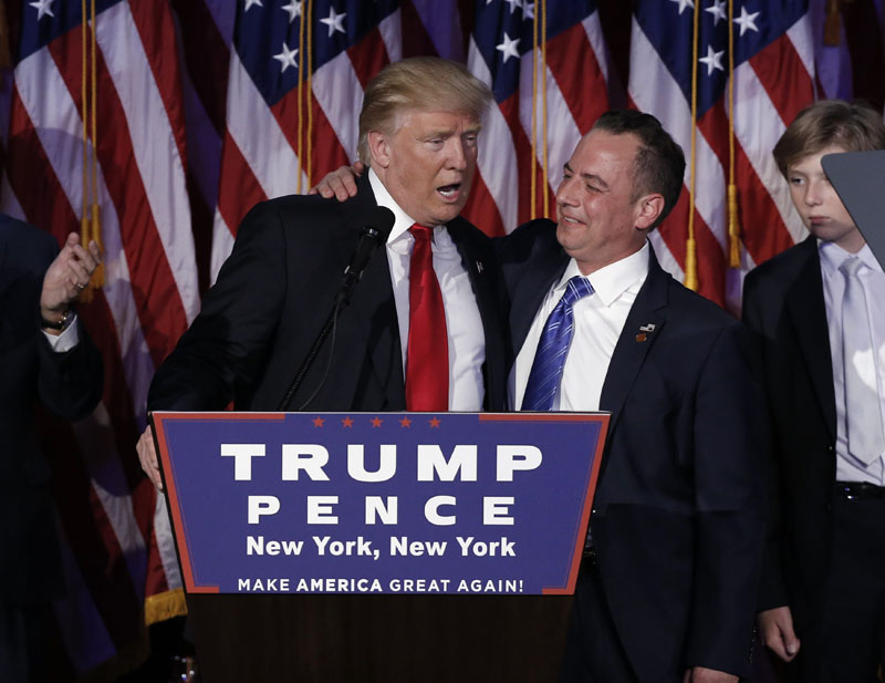 US President-elect Donald Trump and Chairman of the Republican National Committee Reince Priebus (right) address supporters during his election night rally in Manhattan, New York, US on November 9, 2016. Photo: Reuters