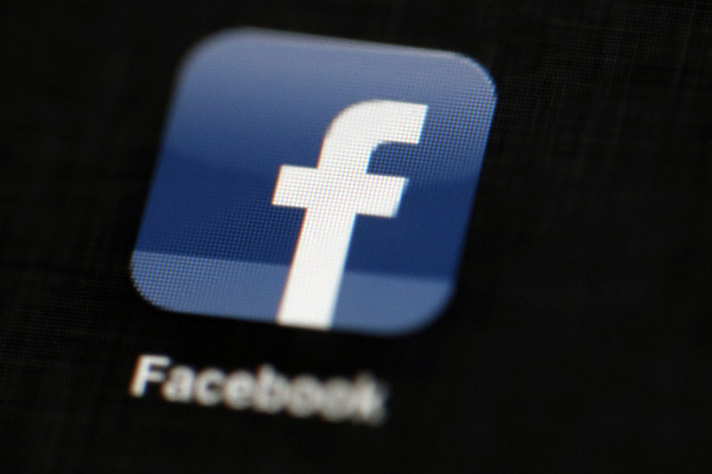 FILE - The Facebook logo is displayed on an iPad in Philadelphia, on May 16, 2012. Facebook reports financial results on Wednesday, November 2, 2016. Photo: AP