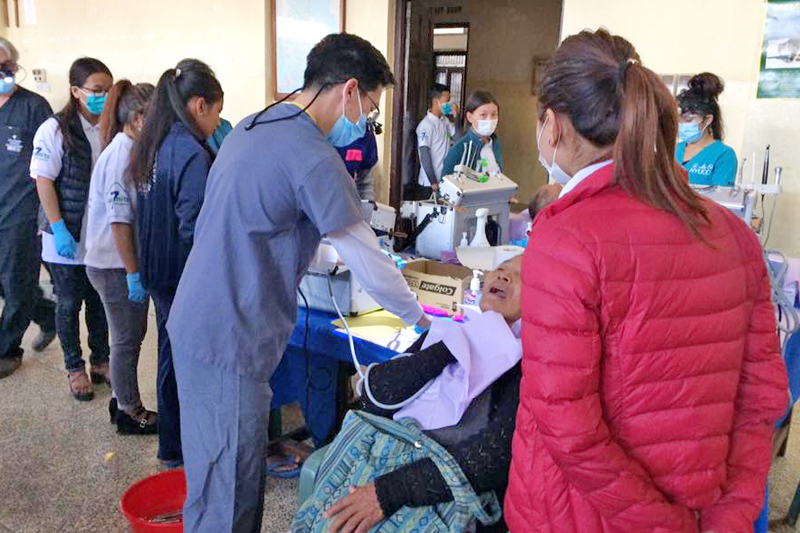 A patient receiving treatment at a free dental camp organised at Srongtsen Bhrikuti High school, Tinchule, in Bouddha, Kathmandu, on Monday, November 7, 2016. The dental camp will last till Friday. Photo: THT