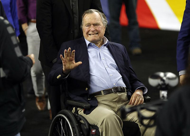 FILE -  In this April 2, 2016, file photo, former President George HW Bush waves as he arrives at NRG Stadium before the NCAA Final Four tournament college basketball semifinal game between Villanova and Oklahoma in Houston. Photo: AP