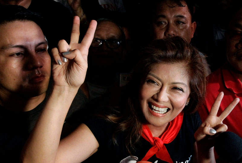 Governor Imee Marcos, daughter of late dictator Ferdinand Marcos gestures after the Supreme Court has allowed a hero's burial for the late dictator in Manila, Philippines, on November 8, 2016.  Photo: Reuters