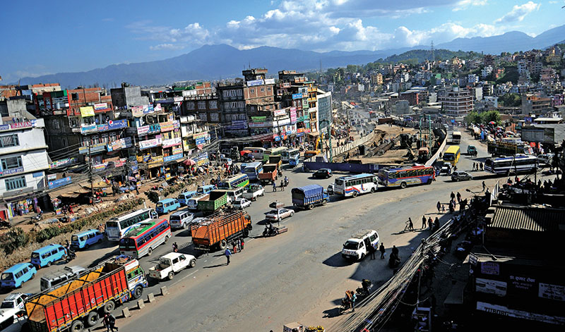 Vehicles preparing to exit from Kalanki Chowk, in Kathmandu, on Sunday, November 6, 2016. An underpass is seen under-construction in the middle of Ring Road as part of the governmentu2019s road expansion drive to ease traffic congestion in Kathmandu Valley. Photo: Balkrishna Thapa Chhetri/THT