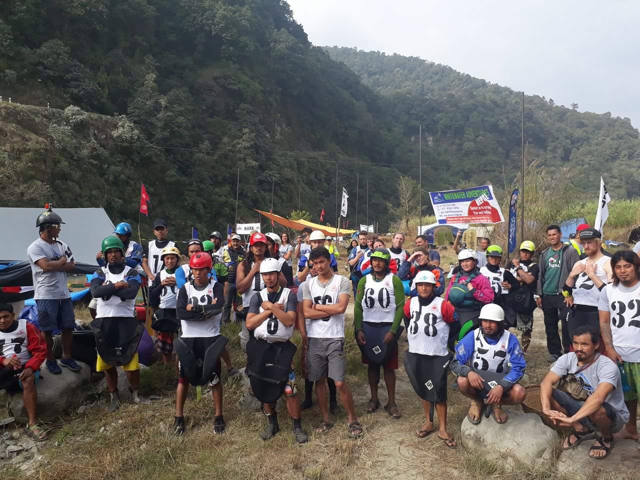 Participants pose for photo during Himalayan White Water Challenge organised by Nepal Association of Rafting Agencies on Monday, November 28, 2016. The kayaking competition has kicked off from today. Photo: Rup Narayan Dhakal