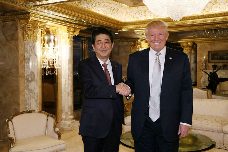 Japan's Prime Minister Shinzo Abe meets with US President-elect Donald Trump (right) at Trump Tower in Manhattan, New York, US, on November 17, 2016. Photo: Cabinet Public Relations Office via Reuters