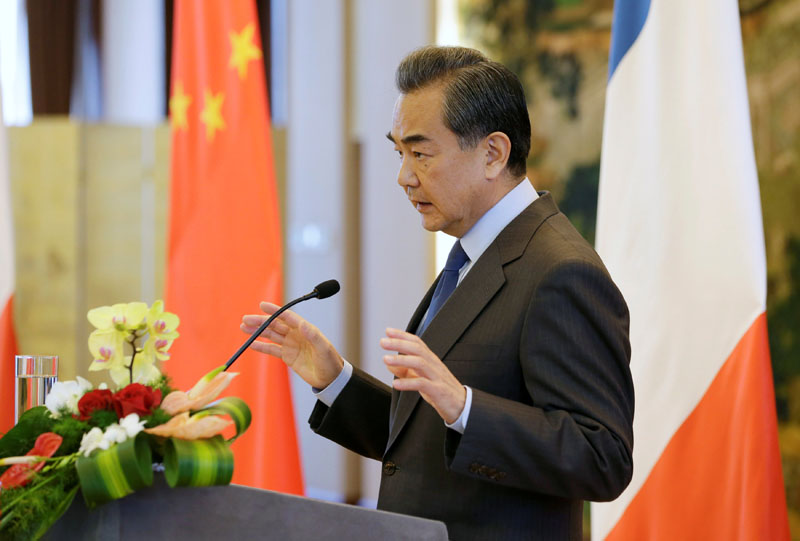 China's Foreign Minister Wang Yi attends a joint news conference with French Foreign Minister Jean Marc Ayrault (not in picture) at the Ministry of Foreign Affairs, in Beijing, China, on October 31, 2016. Photo: Reuters