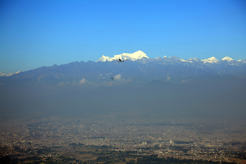 An aircraft prepares to land at the Tribhuvan International Airport from Bhattedanda area of Lalitpur, as pictured on Sunday, November 13, 2016. Photo: RSS