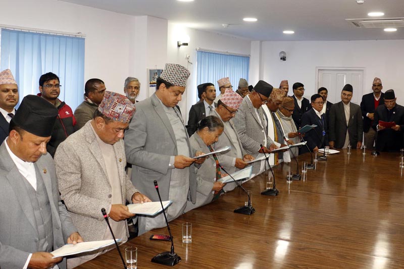 Newly appointed state ministers take the oath of office and secrecy from Prime Minister Pushpa Kamal Dahal in Kathmandu, on Wednesday, November 30, 2016. Photo: RSS