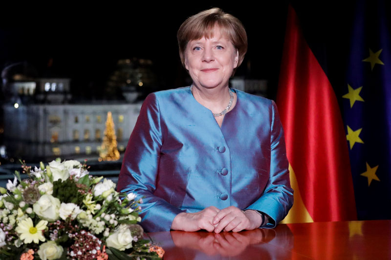 German Chancellor Angela Merkel poses for photographs after the television recording of her annual New Year's speech at the Chancellery in Berlin, Germany, on December 30, 2016. Photo: Reuters