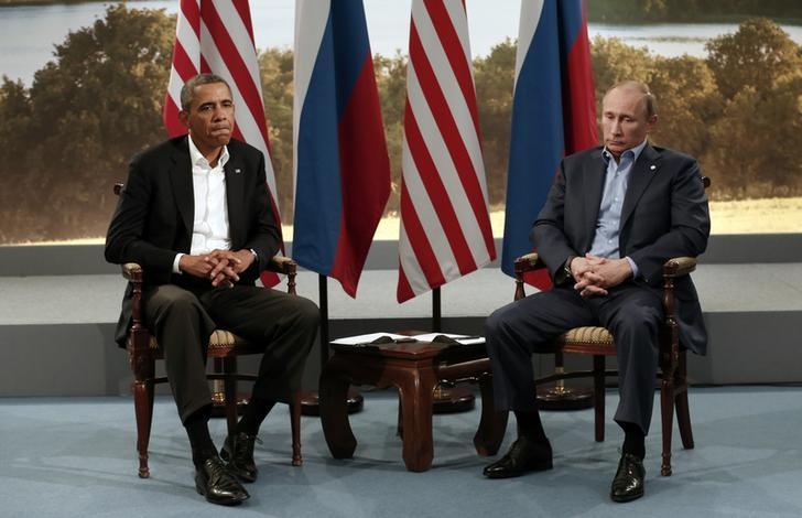 U.S. President Barack Obama (L) meets with Russian President Vladimir Putin during the G8 Summit at Lough Erne in Enniskillen,  Northern Ireland June 17, 2013.   REUTERS/Kevin Lamarque