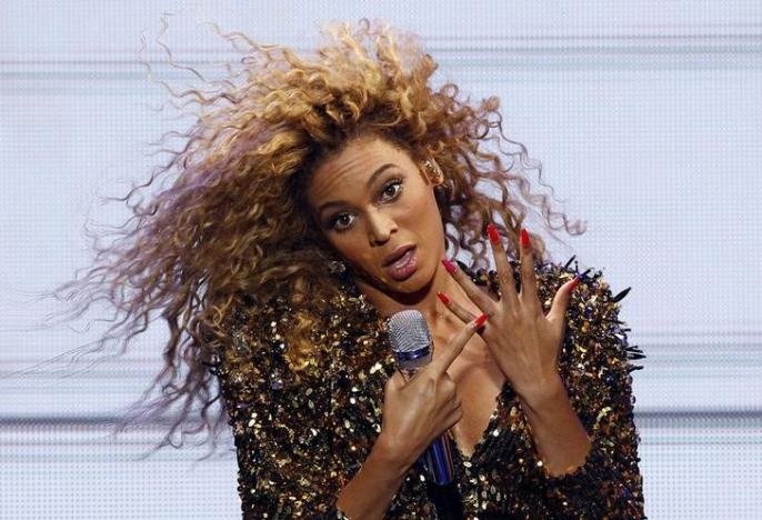 Beyonce performs on the Pyramid stage on the last day of the Glastonbury Festival in Somerset June 26, 2011. REUTERS/Cathal McNaughton/Files