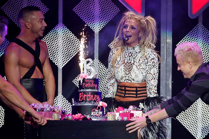 Britney Spears is offered a birthday cake at the conclusion of her performance at iHeartRadio Jingle Ball concert at Staples Centre in Los Angeles, California of US, December 2, 2016. Photo: Reuters