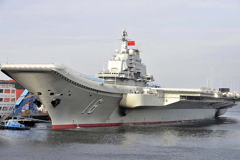 FILE-In this undated file photo released by China's Xinhua News Agency, China's aircraft carrier Liaoning berths in a port of China. Photo: Xinhua via AP