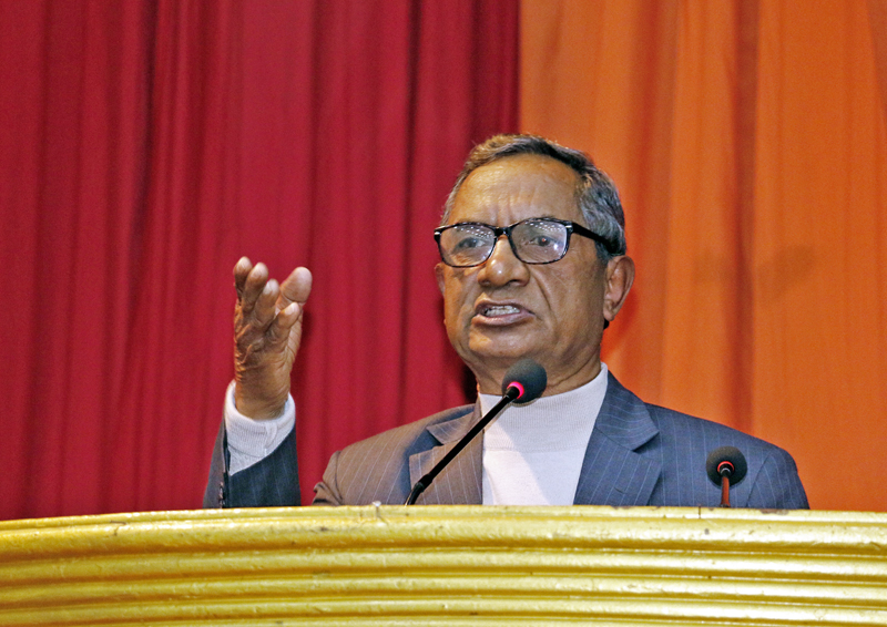 CPN Maoist Centre leader Dinanath Sharma speaks at a programme organised to launch the book 'Chacha', in Kathmandu, on Monday, December 26, 2016. Photo: RSS