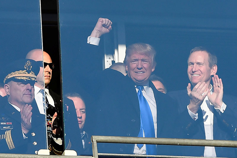 United States of America president-elect Donald Trump waves to the crowd from a suit during the first quarter of the 117 annual Army Navy game at M&amp;T Bank Stadium in Baltimore, USA, on December 10, 2016. Photo: Tommy Gilligan-USA TODAY Sports  via Reuters