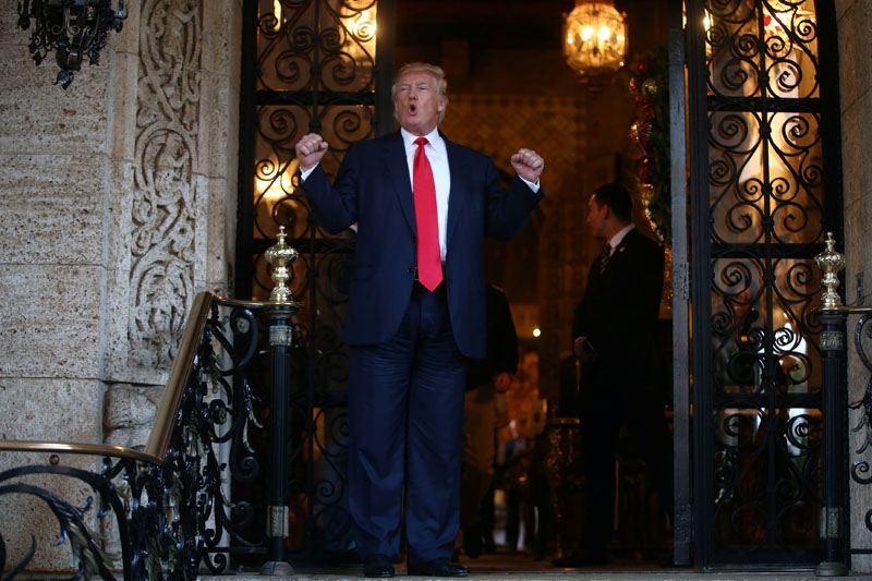 US President-elect Donald Trump talks to members of the media after a meeting meeting with Pentagon officials at Mar-a-Lago estate in Palm Beach, Florida, US, on December 21, 2016. Photo: Reuters