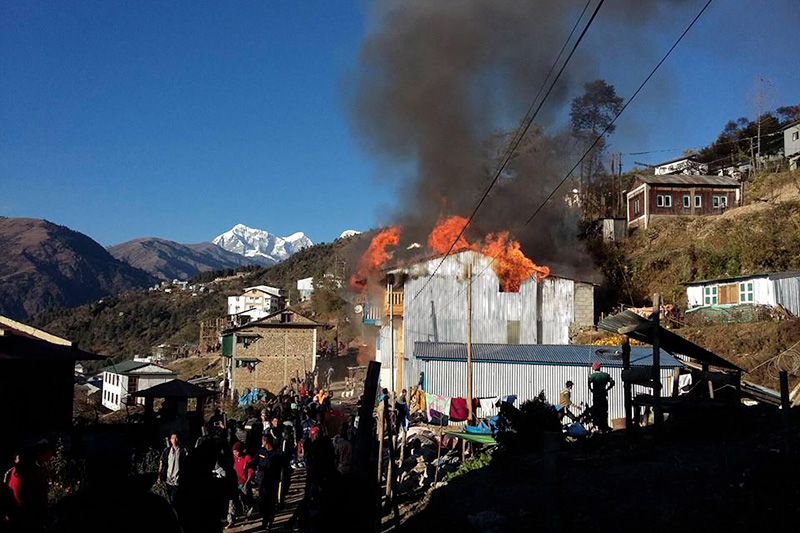 A fire breaks out in a house situated near the District Jail in Salleri, the district headquarters of Solukhumbu, on Thursday, December 8, 2016. Photo: THT Online