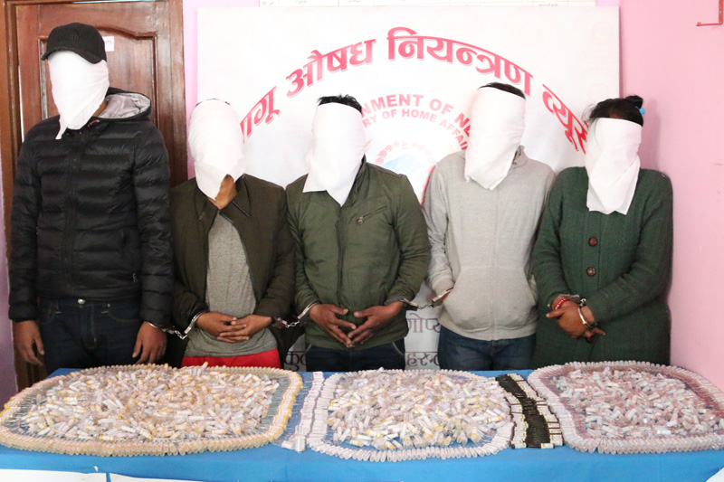 Five persons held with various psychoactive drugs from assorted locations of Kathmabdu being paraded by the Narcotics Control Bureau in December 2016. Photo: NCB