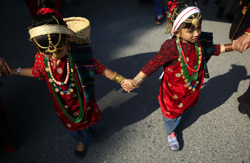 Members of the ethnic Gurung community perform a traditional dance as they take out a rally to mark the Tamu Lhosar (New Year) in Kathmandu, on Friday, December 30, 2016. Photo: Skanda Gautam