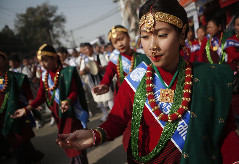 Gurung women wear traditional attire  dance during a parade to mark their Tamu Lhosar in Kathmandu, on Friday, December 30, 2016. Photo: AP