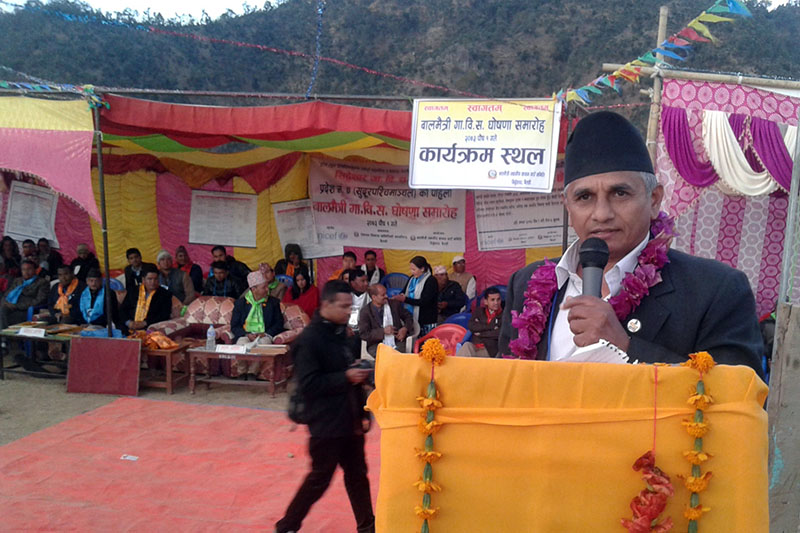 Minister for Federal Affairs and Local Development Hitraj Pandey addresses an interaction to declare Siddheshwar VDC as child-friendly VDC in Baitadi district, on Friday, December 16, 2016. Photo: RSS