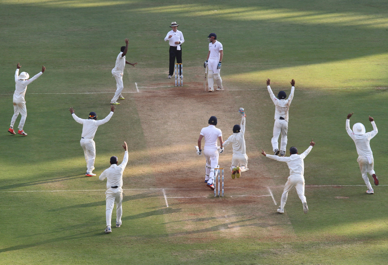 India's players celebrate the wicket of England's Jake Ball. Photo: Reuters