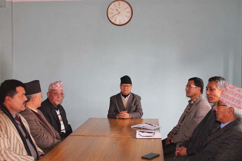 CPN-UML Chairman KP Sharma Oli and Nepal Workers and Peasants Party Chairman Narayan Man Bijukchhe among other leaders of their parties hold a meeting in Bhaktapur, on Wednesday, December 14, 2016. Photo: RSS 