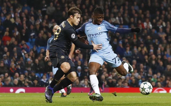 Britain Football Soccer - Manchester City v Celtic - UEFA Champions League Group Stage - Group C - Etihad Stadium, Manchester, England - 6/12/16 Manchester City's Kelechi Iheanacho in action with Celtic's Erik Sviatchenko  Action Images via Reuters / Jason Cairnduff Livepic