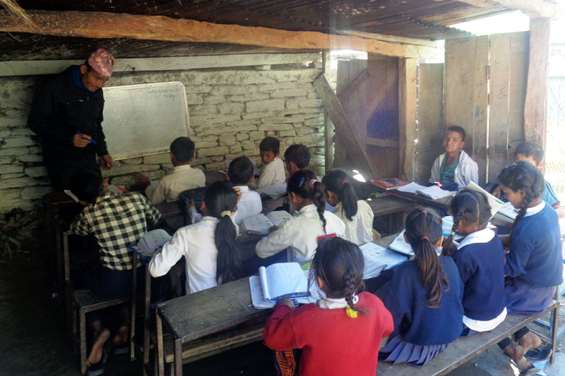 Students are seen studying in a hut due to lack of a proper school building of Siddhartha Gyan Mandir Primary School in Bhagawati in Myagdi district, on Monday, December 19, 2016. Photo: RSS.
