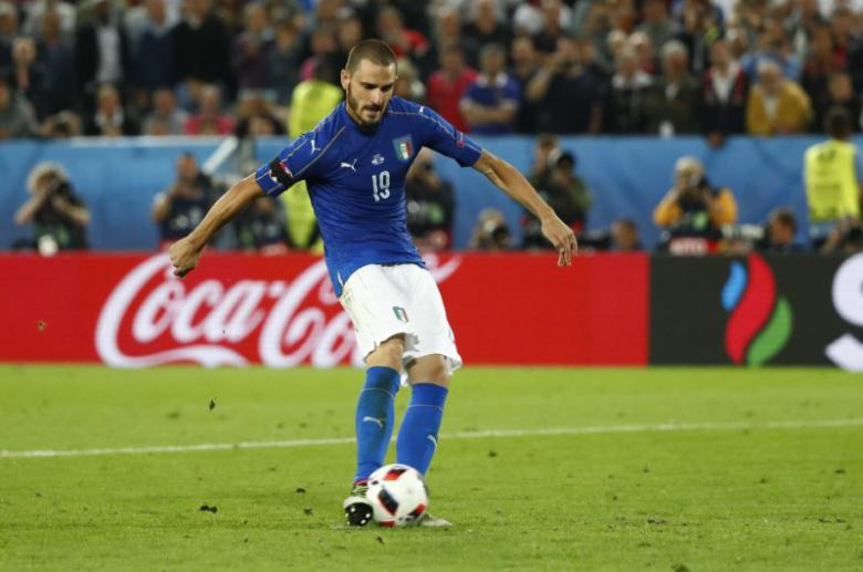 Italy's Leonardo Bonucci misses in the penalty shootout. Photo: Reuters