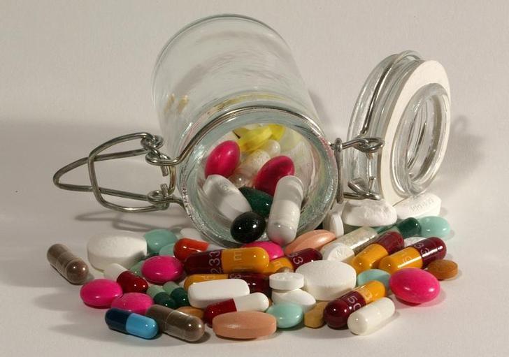 File photo illustration of pills of all kinds, shapes and colours, March 2003.  REUTERS/Jacky Naegelen