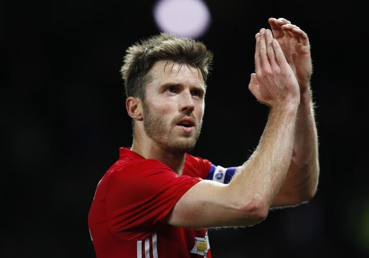 Football Soccer Britain - Manchester United v Manchester City - EFL Cup Fourth Round - Old Trafford - 26/10/16nManchester United's Michael Carrick applauds fans after the game nAction Images via Reuters / Jason CairnduffnLivepic/Files