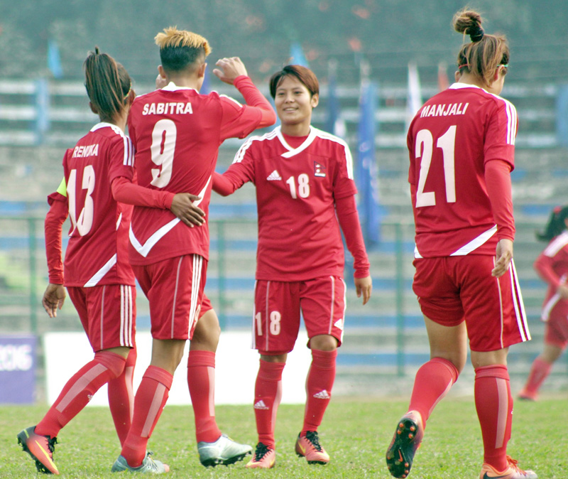 Nepali players celebrate after scoring a goal against Bhutan during the Fourth Women's SAFF Championship in Siliguri of India, on Monday, December 26, 2016. Photo: ANFA
