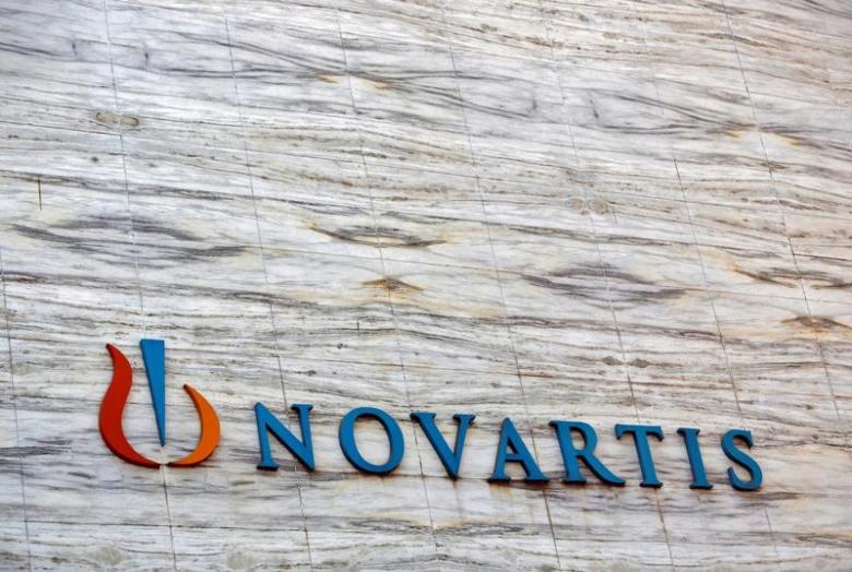 A Novartis logo is pictured on its headquarters building in Mumbai April 1, 2013.  REUTERS/Vivek Prakash/File Photo