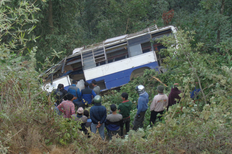 A passenger bus that fell off a road in Pokhara of Kaski on Tuesday, December 27, 2016. Photo: RSS