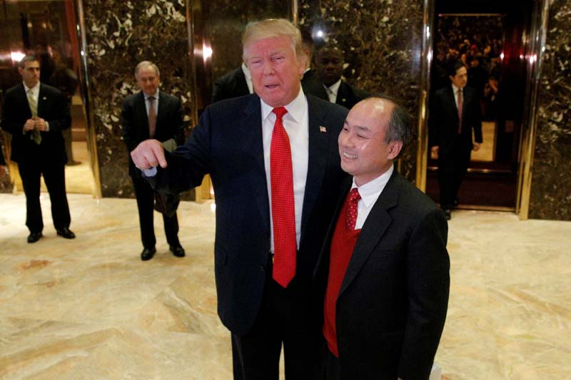 US President-elect Donald Trump and Softbank CEO Masayoshi Son speak to the press after meeting at Trump Tower in Manhattan, New York City, US, on Tuesday, December 6, 2016. Photo: Reuters
