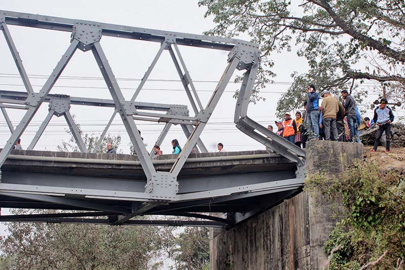 The collapsed bridge over the Baulaha River is seen in Devchuli of Nawalparasi on Sunday, December 11, 2016. Photo: Shreeram Sigdel